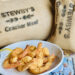 Fried shrimp on plate with burlap bags background.