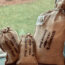Three burlap sacks by window.