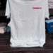 Light blue T-shirt with red Stewby's logo.