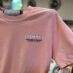 Pink Stewby's Okaloosa Island T-shirt on hanger.