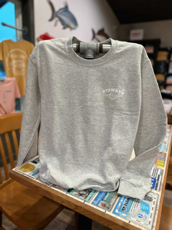 -4748630504606620855 Gray sweatshirt on display with logo.