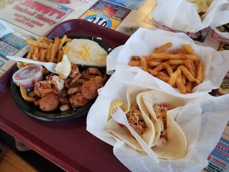 Seafood platter with fries and tacos