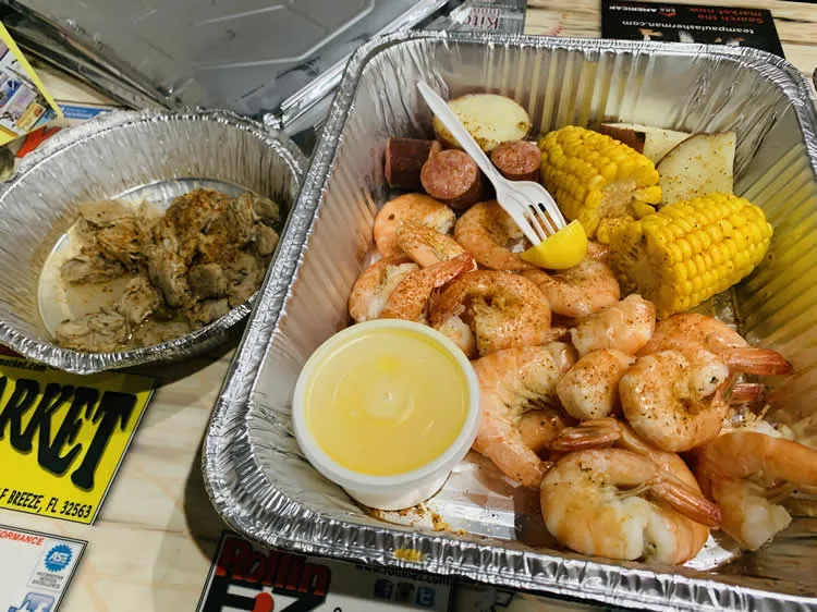 Seafood boil with shrimp, corn, and sausage.